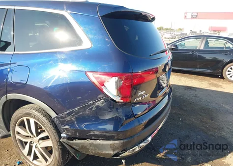 2016 Honda Pilot Touring z USA, uszkodzony, nr VIN 5FNYF5H90GB010900